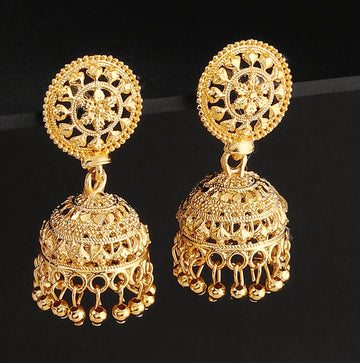 A pair of intricately designed gold-plated jhumka earrings from the Mekkna brand, featuring detailed craftsmanship and a luxurious finish.