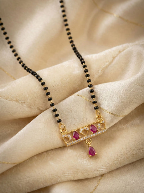 Elegant Gold Plated Mangalsutra With Ruby Coloured Ad Stones